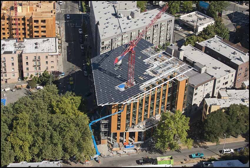 The Bullitt Center, current home to International Living Future Institute and soon-to-be home to Beneficial State Bank, during construction in 2012. The Center is certified by ILFI’s rigorous Living Building Challenge for its sustainable design. The Bullitt Center, current home to International Living Future Institute and soon-to-be home to Beneficial State Bank, during construction in 2012. The Center is certified by ILFI’s rigorous Living Building Challenge for its sustainable design.
