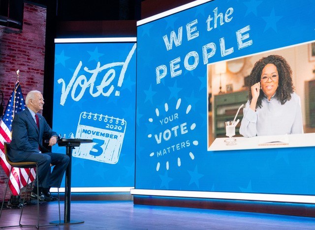 A photo of President Joe Biden talking to Oprah at a digital event during the 2020 campaign.